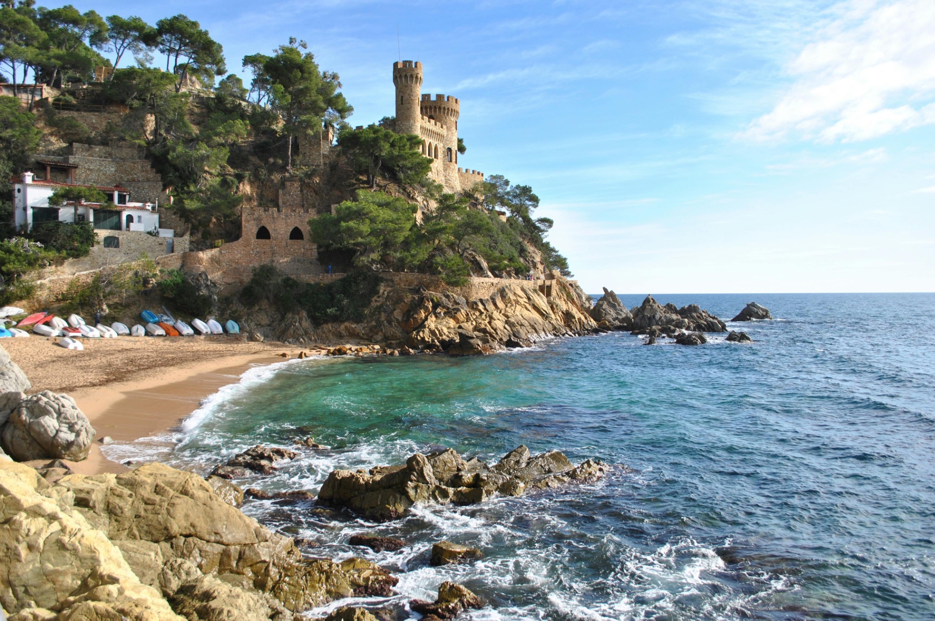 Tossa de Mar medieval town walls and turquoise sea, a day trip from Lloret de Mar